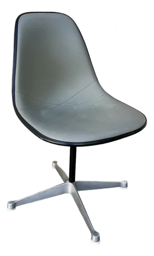 Mid Century Modern Swiveling Molded Chair by Eames for Herman Miller. Circa 1960s.