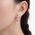 Inspired by the graceful beauty of bluebells, these elegant drop earrings are handcrafted in 18ct white gold and set with...
