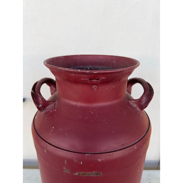 This rustic artifact has been given a rich brick red color. It will make a warm statement of welcome to your guests as...