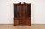 A gorgeous Georgian or Chippendale style lighted breakfront bookcase cabinet or dining cabinet In the manner of Baker...