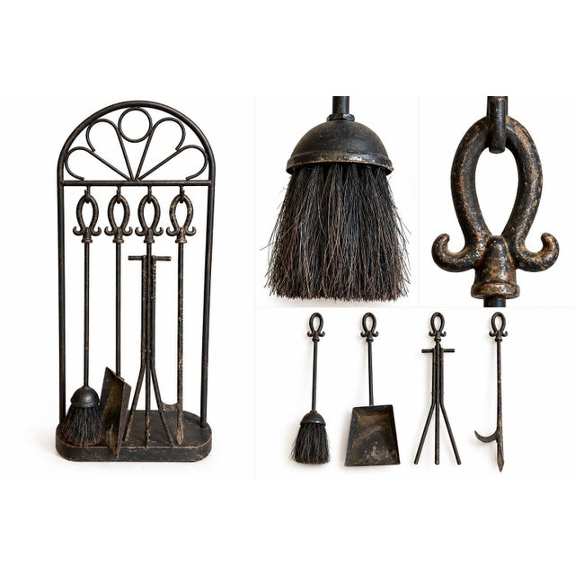 Decorative black metal fireplace tool set featuring a rustic farmhouse and traditional vintage-inspired design. Includes 4...