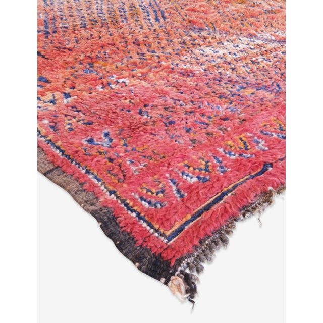 Vintage Moroccan Beni Mguild Rug – Deep Coral Beauty & Tribal Geometry This striking vintage Beni Mguild rug embodies the...