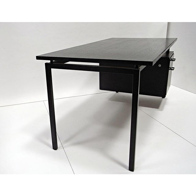 There are two identical tables available, as well as additional tables of the same model. This piece has an attribution...