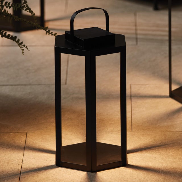 Illuminate the evening with the energy of the sun. The Joyce Solar LED Lantern is a contemporary lantern designed with a...