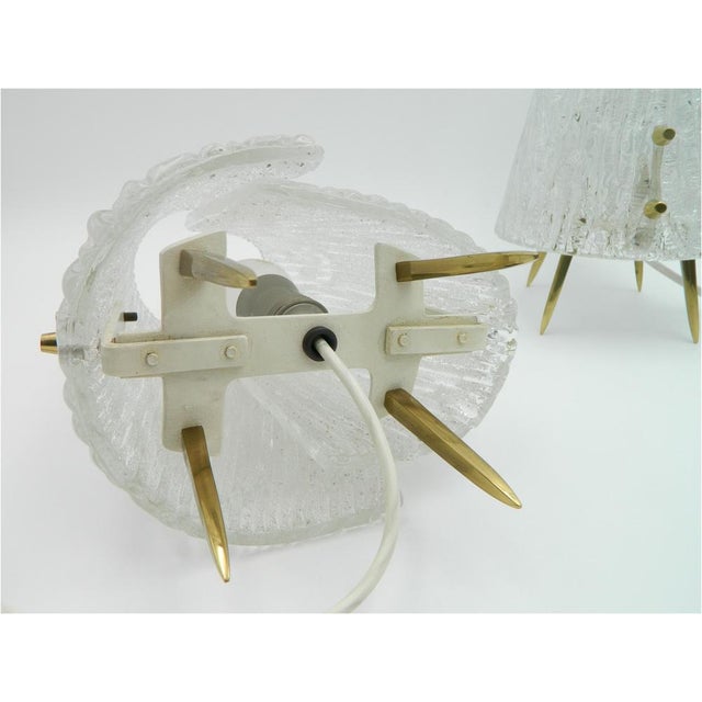 Beautiful pair of ice glass table lamps from Kalmar Vienna from the 60s. A lamp consists of a metal frame with an E14...