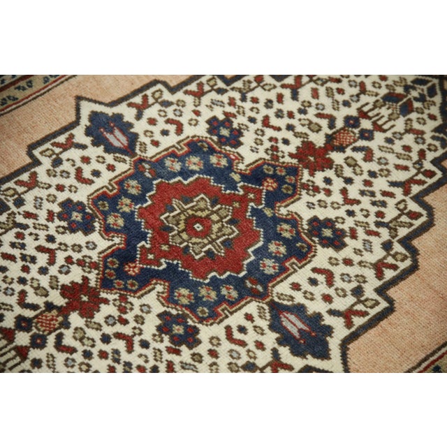 Introducing a one-of-a-kind vintage Turkish hand-knotted wool rug, carefully crafted by skilled artisans using traditional...