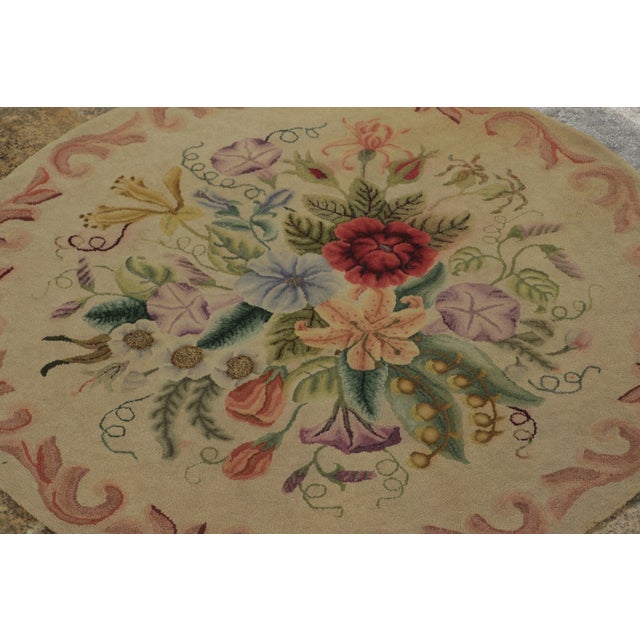 This 3x3 antique circular hooked rug is an exciting new addition to Rug & Kilim’s Antique collection—a romantic folk-art...