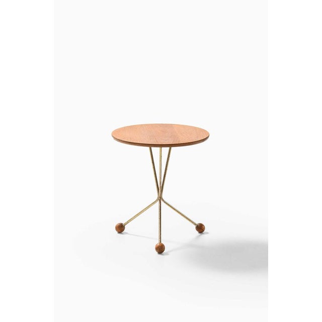 The Bord på burk side table, produced by Alberts in Tibro, Sweden, is a delightful example of Swedish mid-century modern...