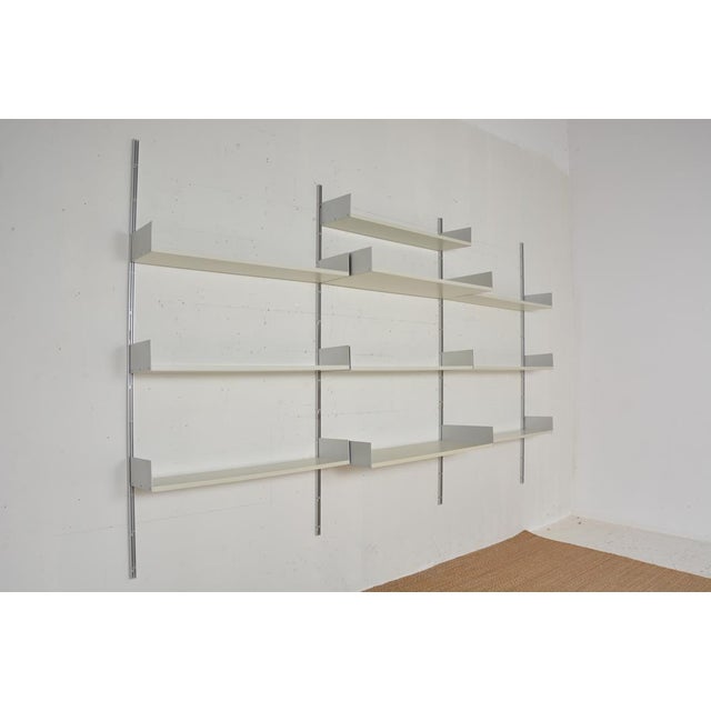 Modular shelving system by designer Dieter Rams produced by Vistoe, Germany Aluminum and white melamine, dating from the...