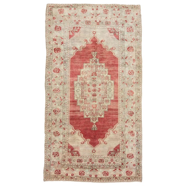 Vintage Washed Out Turkish Wool Rug- 5′8″ × 10′10″ For Sale