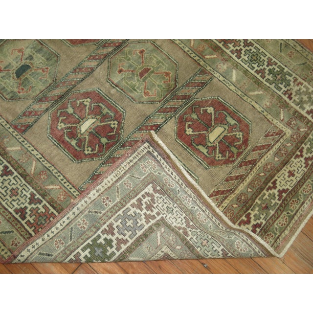 Mid 20th-century Turkish Anatolian rug in damp mud tones Measures: 4'1" x 6'2''.