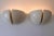 Set of two award winning minimalistic and elegant mid-century modern oktavo two-flamed wall lamps or sconces. Model...