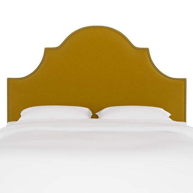 Classic curves wrapped in smooth upholstery, then accented with elegant ornamental nailheads, gives this Upholstered...