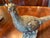 One pheasant has small chip on ear. Add timeless elegance to your décor with this Antique Silver Resin Pheasant Pair....