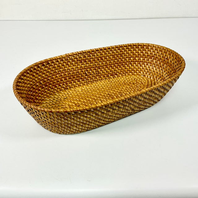 We love this basket. It’s perfect to serve bread at your table. It’s a lovely tight weave and chestnut color stained...