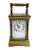 French miniature brass carriage clock in case. The carriage clock in black leather case has an enamel dial with Roman...
