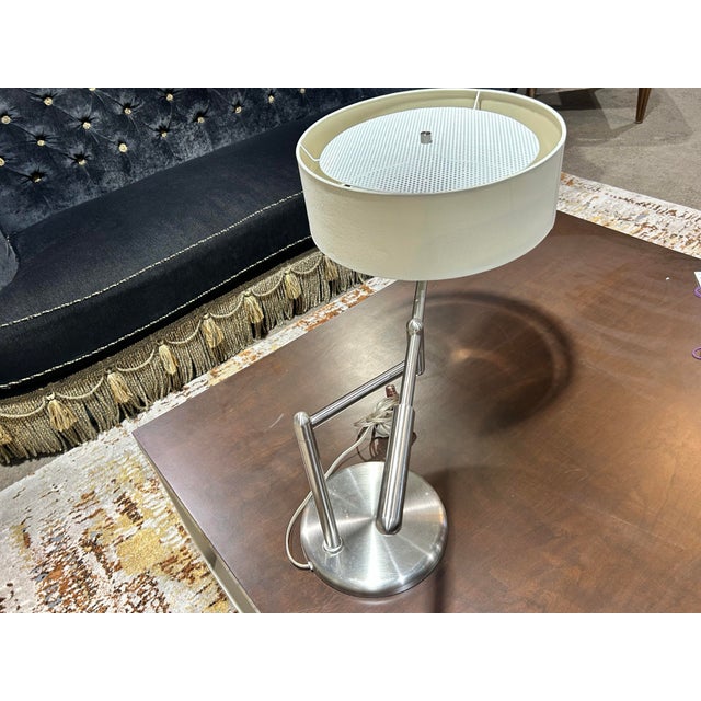 Illuminate your space with timeless flair using this Mid-Century Modern Swing Arm Lamp, a perfect blend of vintage charm...