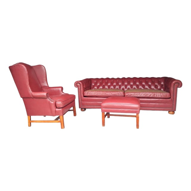 Vintage-Inspired 3-Piece Leather Living Room Set With a Tufted Chesterfield Sofa, a Classic Wingback Armchair & Rectangular Ottoman. For Sale