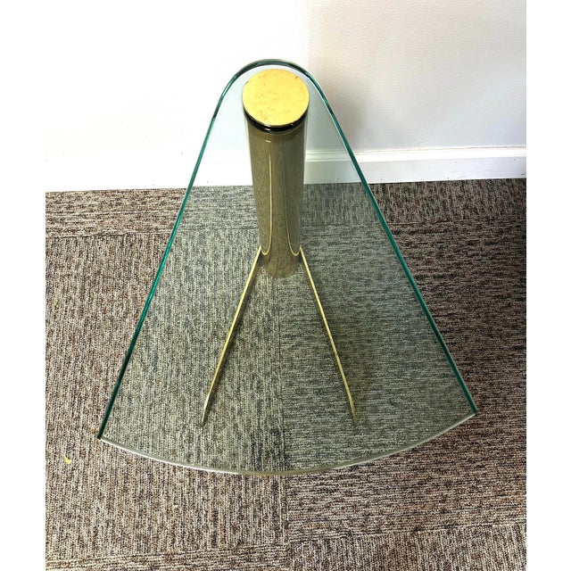 Stunning attributed to Leon Rosen for Pace Collection accent table. Polished brass and thick glass wedge table measuring...