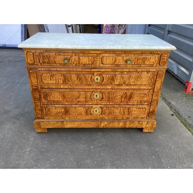 This is a rather unique French Louis-Philippe period chest of drawers. The core construction of this piece is oak and...