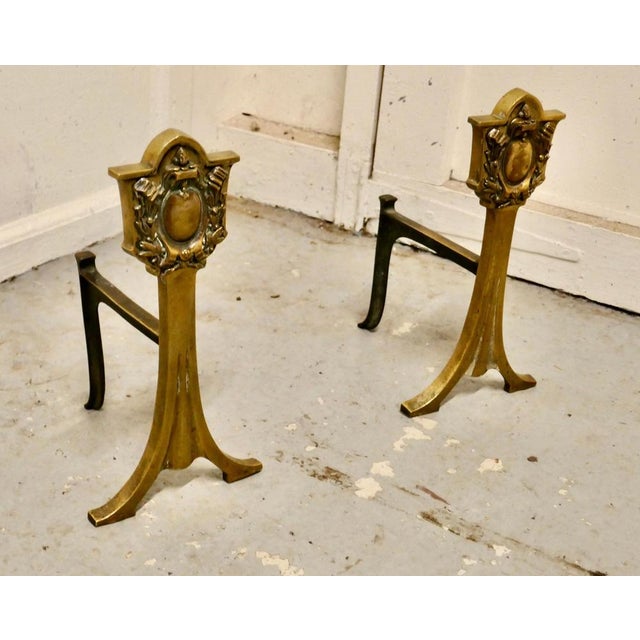 An elegant pair of 19th century brass fire dogs or fire dogs This very attractive pair of brass fire dogs, they they are...