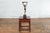 A vintage Art Deco style bronze table lamp on marble base from the mid 20th century depicting a dancer holding a ring with...