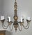 An elegant and finely proportioned Italian chandelier dating to the late 19th century, carved in wood and gesso with...