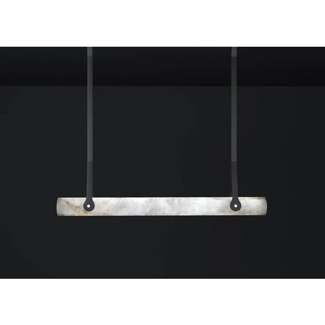 Zeus black leather pendant lamp by alabastro italiano dimensions: d 11 x w 120 x h 100 cm. Materials: white alabaster and...