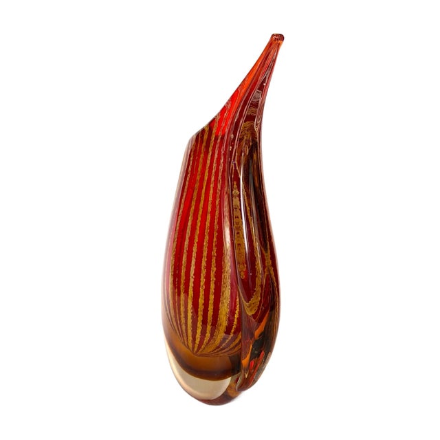 This is an art glass created from red and gold glass creating a stunning effect. The label is missing but it is made by...