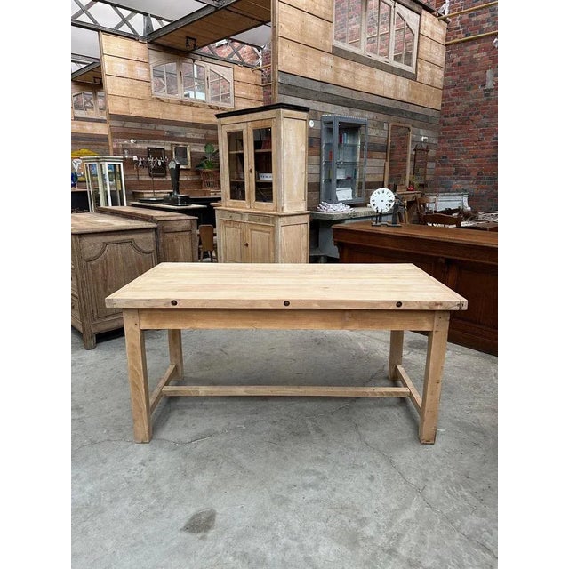 Antique butcher's table in solid beech dating from the 50's. Features 2 functional drawers on one side. Height under...