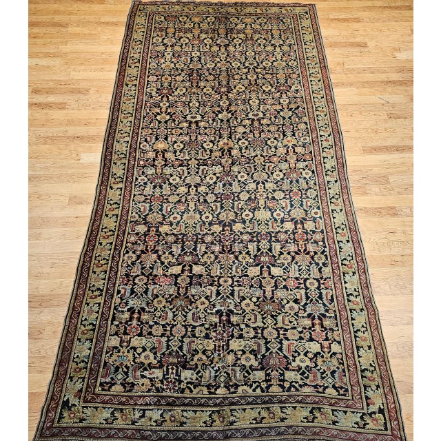 This striking late 19th century Caucasian Karabagh gallery rug, woven in the final quarter of the 1800s, exemplifies the...