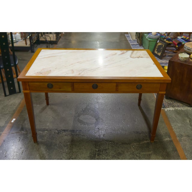 Alate 20th century pink marble slab top wooden desk with three deep drawers. Possibly a custom fabrication piece. Unmarked.