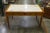 Alate 20th century pink marble slab top wooden desk with three deep drawers. Possibly a custom fabrication piece. Unmarked.