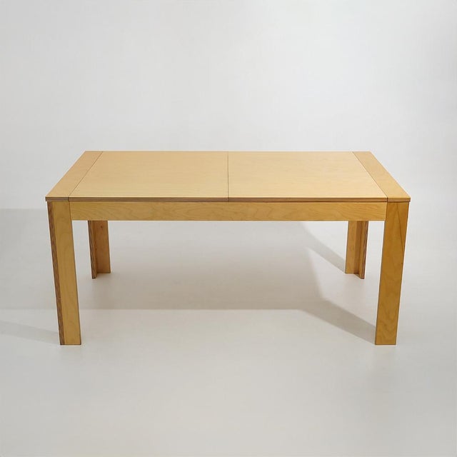 An extendable maple dining table with an extremely clean design language, defined by rigorous proportions and minimalist...