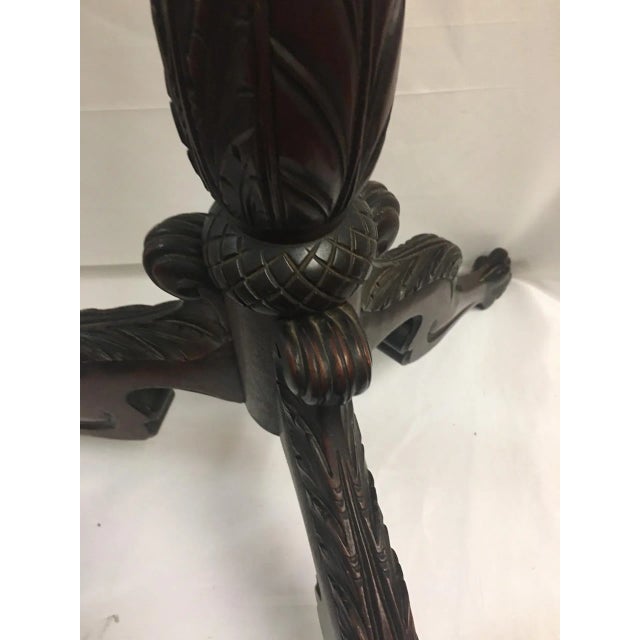 This unique floor-standing adjustable mahogany stand could accommodate both music or a book. Features include an acanthus...