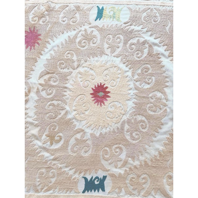 Boho Vintage Suzani from Uzbekistan, circa late 1960s. Dimension; 50'' x 60'' inches / 128 x 153 cm / 4'2'' x 5' Material:...