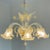This vintage Italian glass floral chandelier, inspired by Murano, showcases exquisite craftsmanship and timeless beauty....