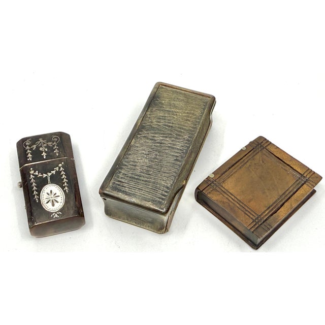 A lovely little group of three Victorian Match safes and little trinket boxes. One is horn with silver inlay. It opens...