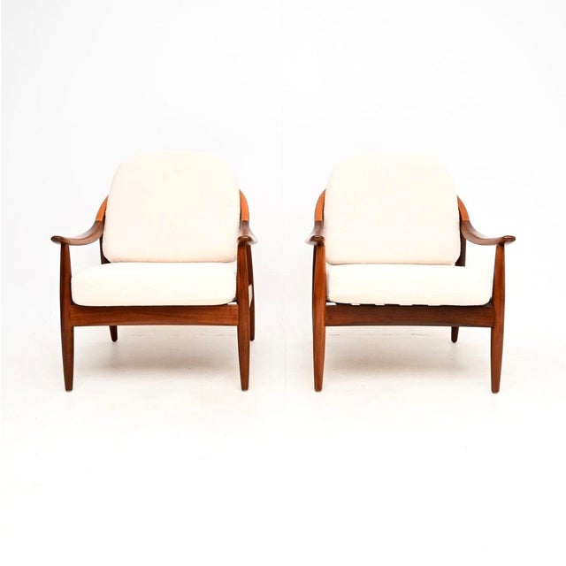A very stylish pair of vintage armchairs by Greaves and Thomas. These were made in England, they date from the 1960’s. The...