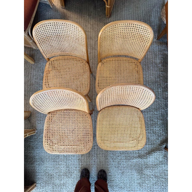 Set of four iconic cane bentwood chairs designed by Josef Hoffmann, model no. 811, and produced by FMG, circa 1960s. These...