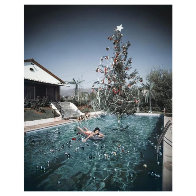 Slim Aarons, Christmas Swim, Estate Stamped Photographic Print, 1956 / 2020s For Sale
