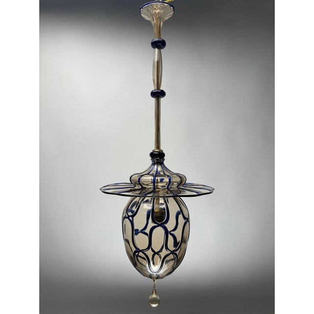 This blown glass chandelier is a piece of great elegance and refinement by vittorio zecchin, a master of murano glass in...