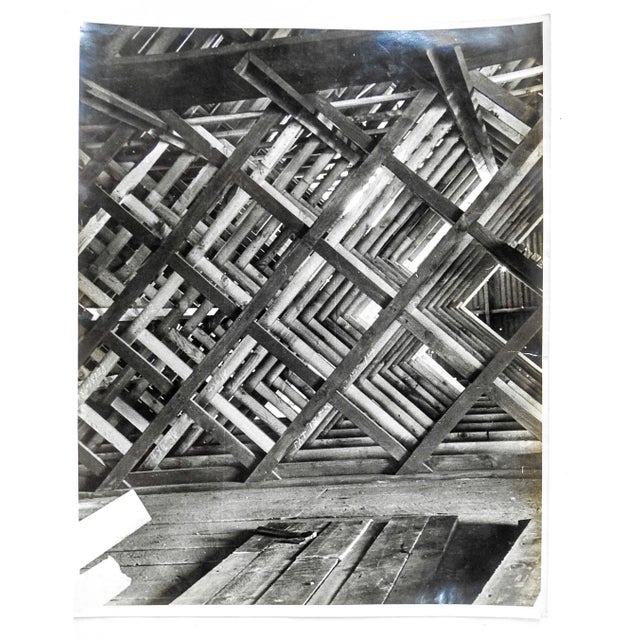 Vintage circa 1940's photograph of abstract interior architectural truss system. Unsigned. Unframed.