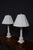 Elegant pair of Neoclassical-style table lamps crafted in solid white marble with fluted column shafts and stepped plinth...