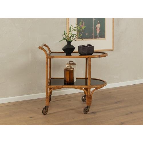 1950s serving trolley Very good workmanshipHigh-quality materialsMade in Germany Width: 45 cm Height: 68 cm Depth: 71 cm...
