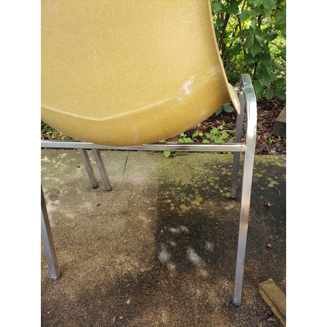 Vintage Mid-Century Modern Ochre Molded Fiberglass Armless Side Chair that is Stackable Multi-purpose chair, great for...
