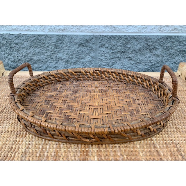Excellent woven bamboo tray! Timeless basketweaving precess would be lovely for serving or on a bar cart or even vanity...