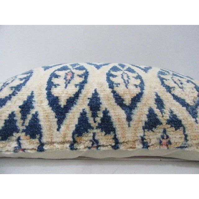 This is a pillow cover made from a vintage kilim rug. The piece was properly washed and ready to use. Pillow inserts not...