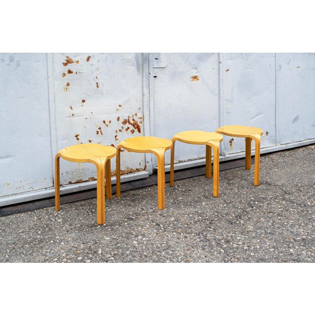 Stools with fan-shaped legs in curved birch plywood. Model x600 Designer Alvar Aalto Manufacturer Artek 1970s This piece...