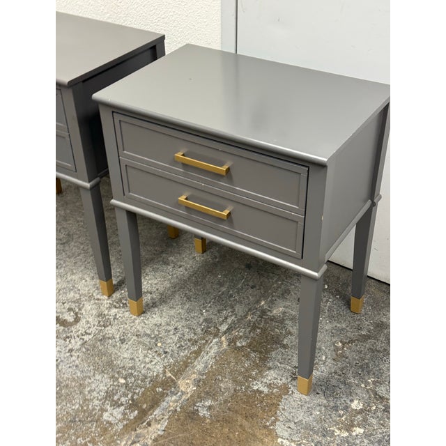 Design Plus Gallery presents a Pair of Nightstands from Ameriwood Home. This matching set has a streamlined gray case with...